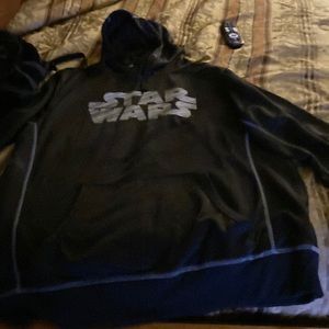 Long sleeve black spandex pullover hoodie with Star Wars written on the front
